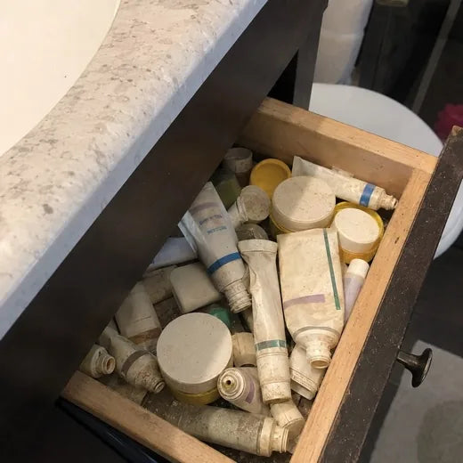 A drawer of half-used bruise creams